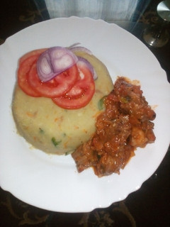 A picture of Mashed potatoes with beef.