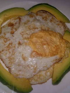A picture of Keto Breakfast of sunny side up & Avocado.