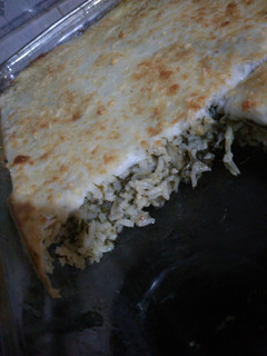 Una foto de Pastel de arroz con acelga y salsa blanca