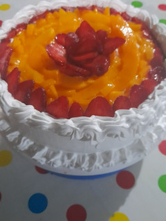 A picture of Peach and Strawberry Tres Leches Cake.