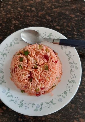 A picture of Veg schezwan fried rice with beetroot.