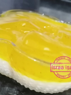 صورة لوصفة تحلية كريمة جوز الهند 🥥 مع جيلي الليمون 🍋