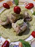Rotolini di branzino, con lardo e pistacchi su pesto di zucchini rucola e pistacchi