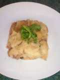 Capeado de papa relleno de carne, vegetales y queso mix