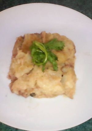 Una foto de Capeado de papa relleno de carne, vegetales y queso mix
