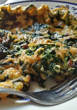 A picture of Egg with Spinach.