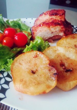 Una foto de Costilla de Cerdo y papa con clavo de olor al Horno