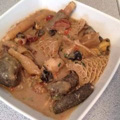 A picture of Nsala soup with assorted.