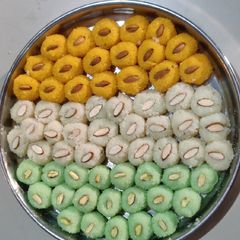 A picture of Tricolour coconut laddoo.