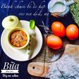 Bánh chuối hấp bí đỏ rắc vụn dừa mè đen