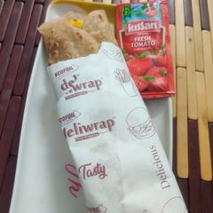 Wheat cheese veggie wrap A picture of Wheat cheese veggie wrap.