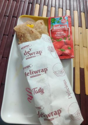 A picture of Wheat cheese veggie wrap.