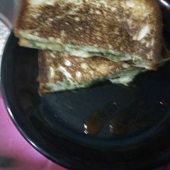 A picture of Green white sandwich.