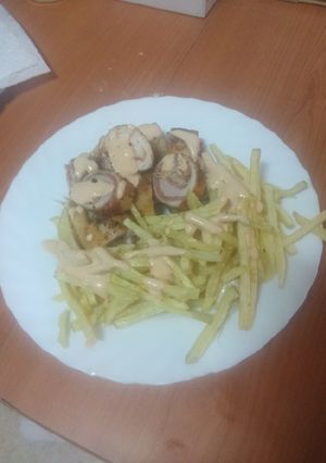 Una foto de Flamenquines de pollo con jamón serrano y espárragos blancos