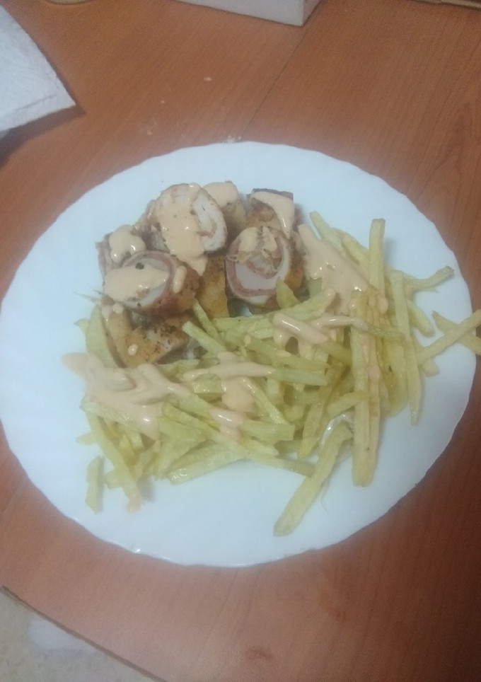 Una foto de Flamenquines de pollo con jamón serrano y espárragos blancos