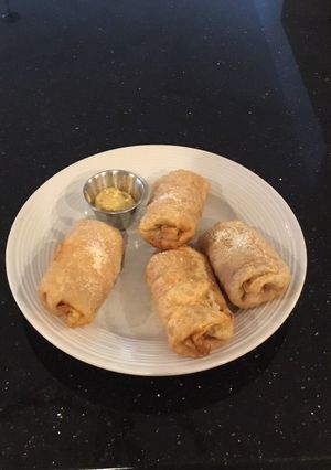 A picture of Ham and cheese spicy egg rolls.