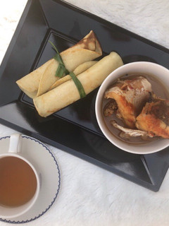 A picture of Pancake roll with fish pepper soup.