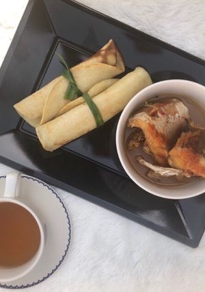 A picture of Pancake roll with fish pepper soup.