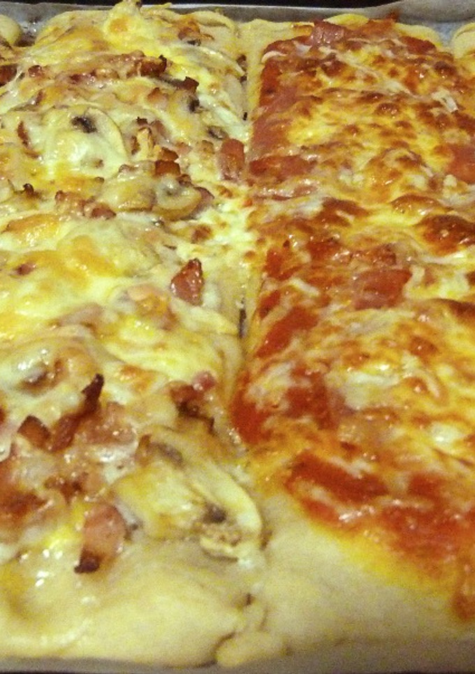 Una foto de Surtido de pizzas caseras XL tamaño 25x38cm