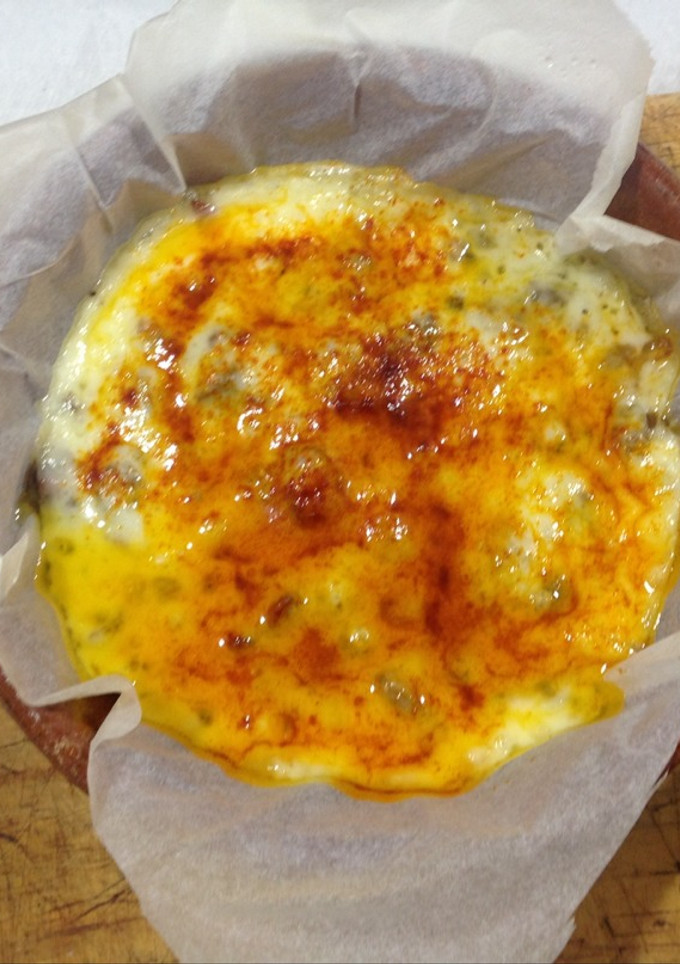 Una foto de Provolone relleno de setas