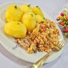 A picture of Boiled Irish potatoes with egg sauce.
