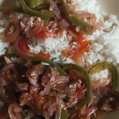 A picture of Tender wet fry beef served with semi chilled boiled rice 😋.