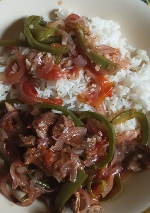 A picture of Tender wet fry beef served with semi chilled boiled rice 😋.