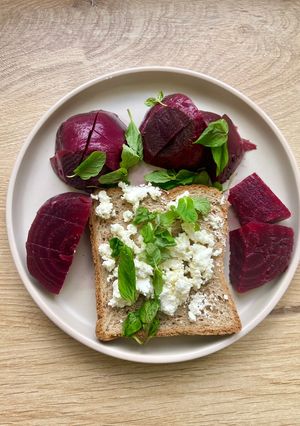 A picture of Whole Grain Toast with Goat Cheese, Beetroot & Fresh Mint.
