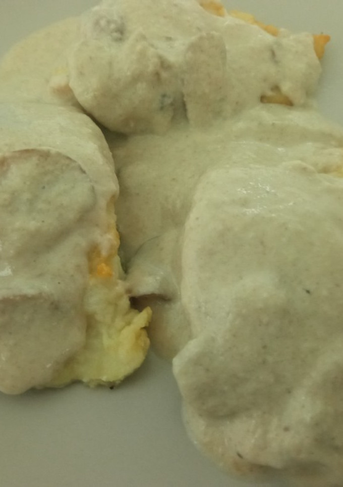Una foto de Bacalao con salsa de champiñones
