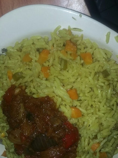 A picture of Soyayyar shinkafa(fried rice) & beef sauce.