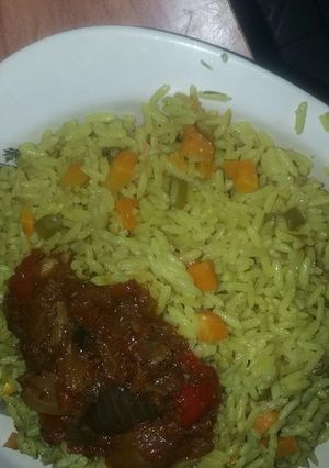 A picture of Soyayyar shinkafa(fried rice) & beef sauce.