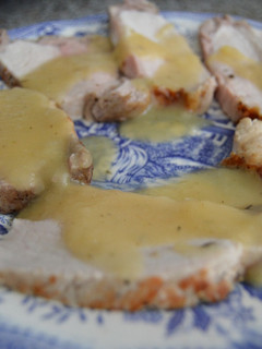 Una foto de Lomo con salsa de manzana