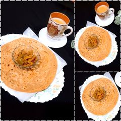 A picture of Achari Masala with Paratha & Chai☕.
