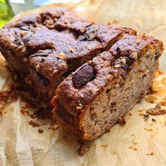 A picture of Banana Bread with dark chocolate 🍌🍞 🍫.