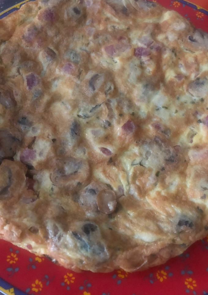 Una foto de Tortilla champiñones con jamón