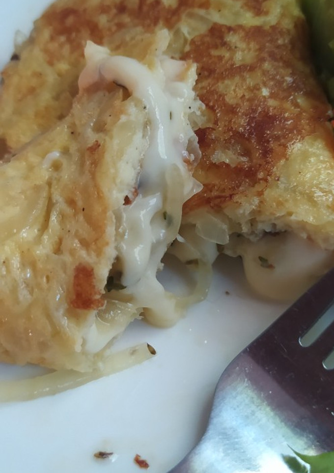 Una foto de Omelette Doble Cebolla y Queso