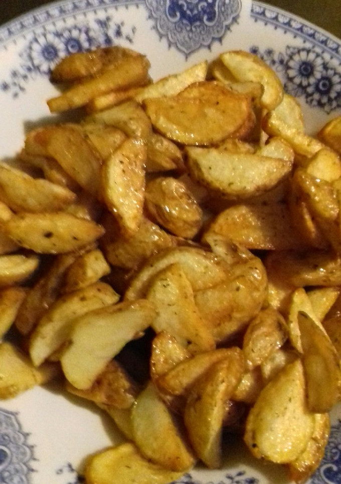 Una foto de Gajos de papas con especies