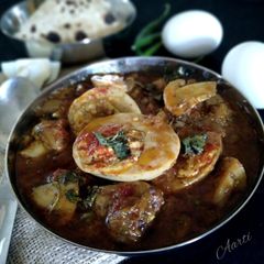 A picture of Egg mushroom korma.