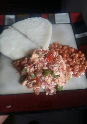 A picture of Boiled Yam Veggies Omellete and Baked Beans.