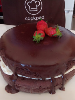 A picture of Semi-naked chocolate gateau cake.