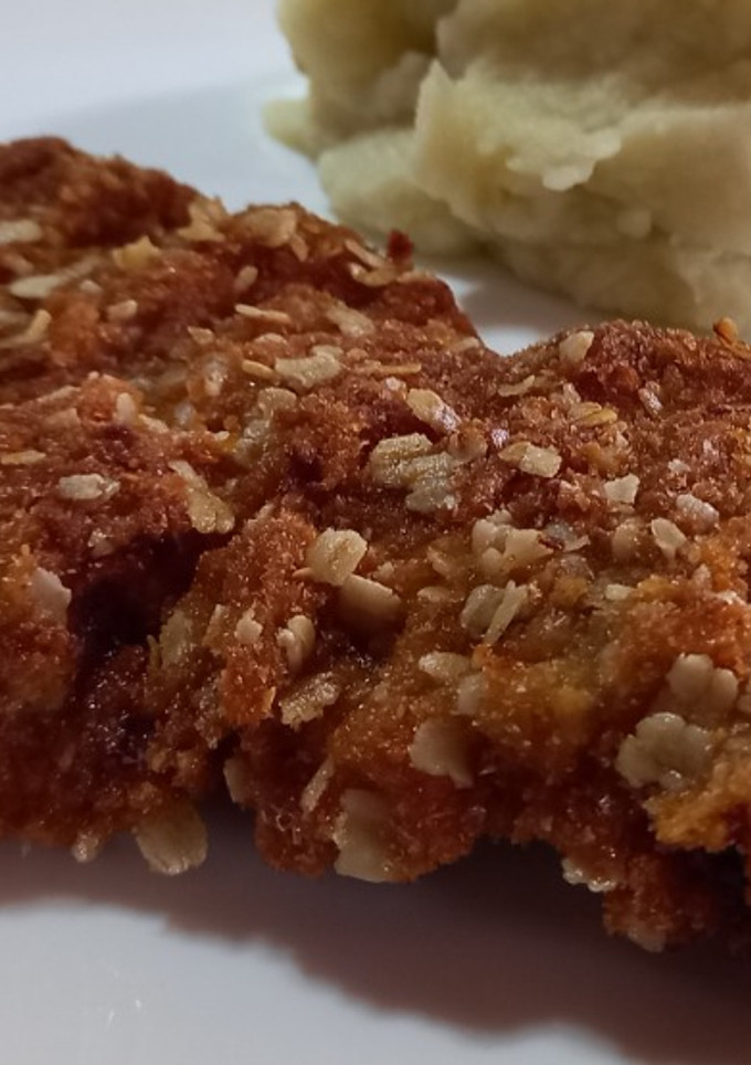 Una foto de Milanesa de cerdo crocante