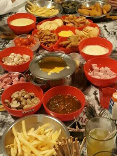 Una foto de Fondue con Queso cheddar