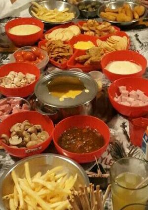 Una foto de Fondue con Queso cheddar