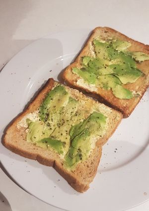 A picture of Super basic and unflattering but delicious Avocado Toast.