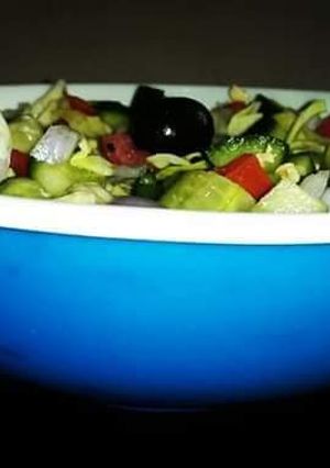 A picture of Desi Salad🍋🍅🌰🍀.