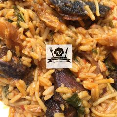Native jollof rice and spaghetti 😋 A picture of Native jollof rice and spaghetti 😋.