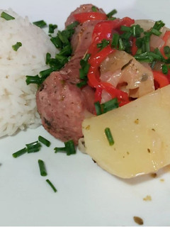 Una foto de Chorizos al vino blanco