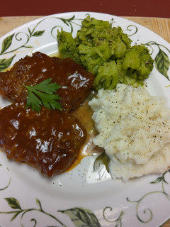A picture of Lee's Smothered Swiss Style Steaks.