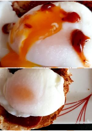 A picture of My Bacon and Egg toasted Muffin with smoked Bacon sauce😁.
