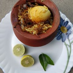 A picture of Hyderabadi Egg Dum Biryani.